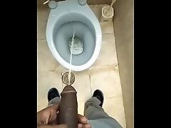 Pissing in Public Bathroom