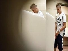 Twink boy spy cam pissing public toilet