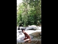 naked at the river with big cumshot