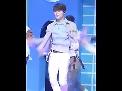 Asian Twink dances to a song about touching eachother in front of audience.