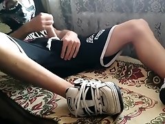 Skater twinks masturbate together to porn