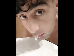 Spitting guys cum and licking it again in hotel bathroom - cum play